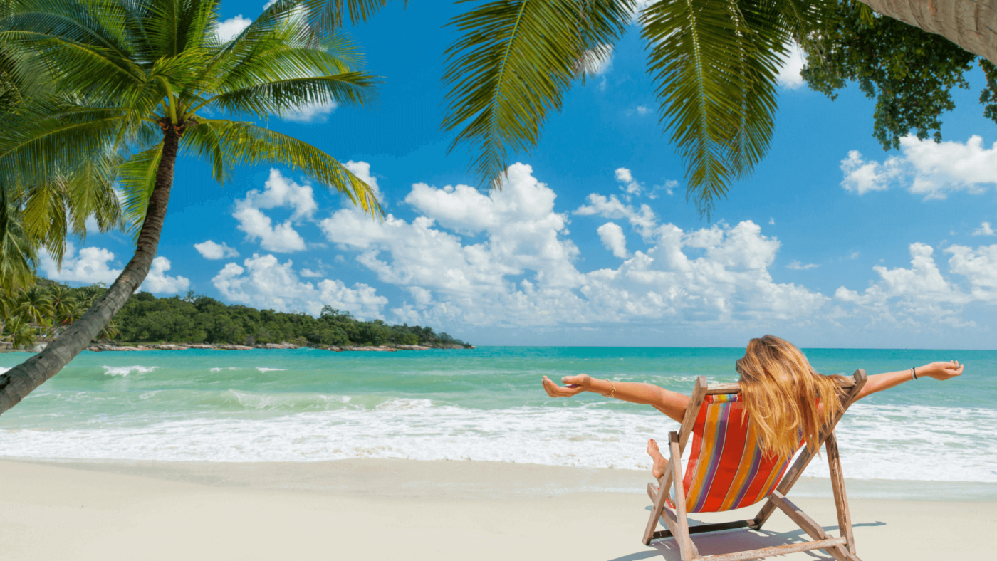 Women Sitting in Beach Alone in Chair