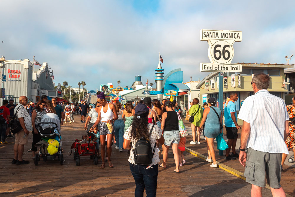 Jeanette-walking-Santa-Monica-Boardwalk