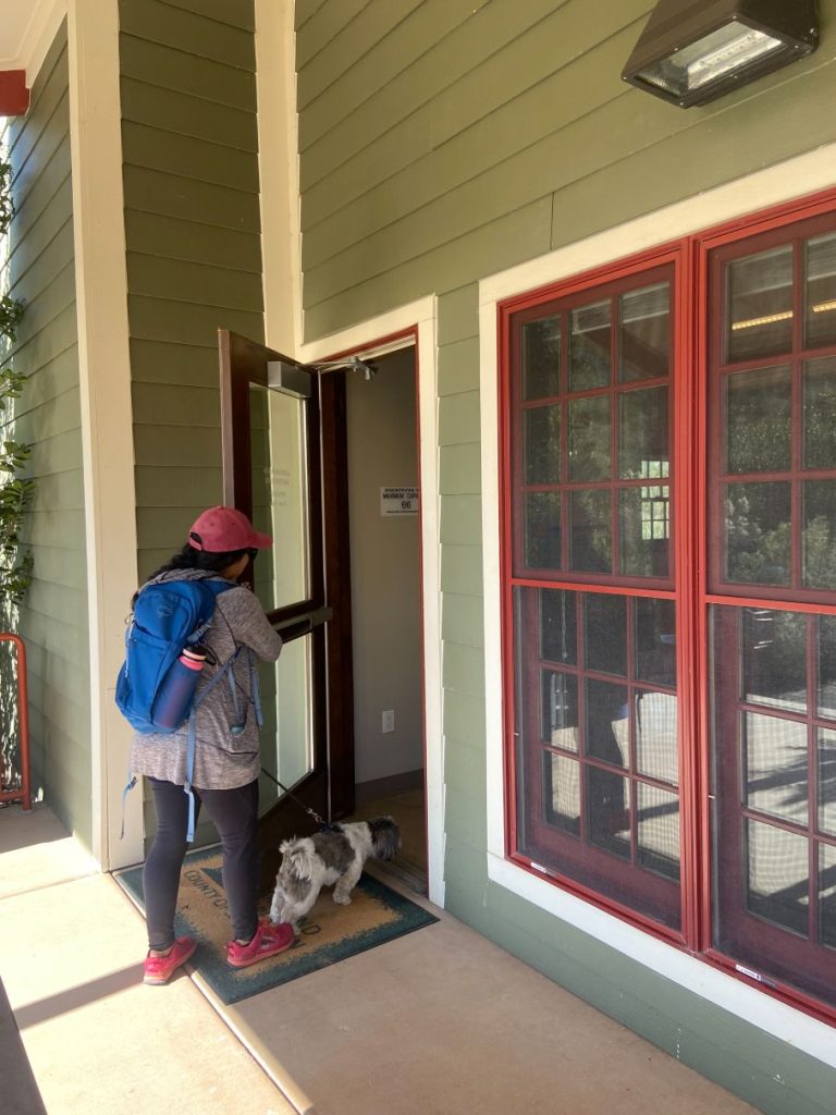 eanette and Tutu walking inside Visitor Center